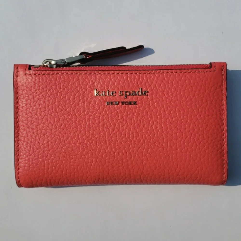 Kate Spade Leather Roulette Small Slim Bifold Wallet. Color: Peachmelba.